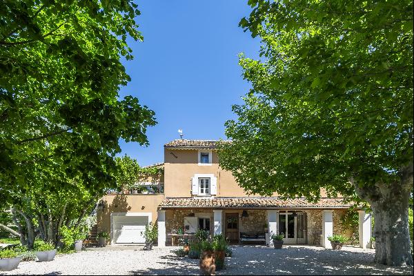 An elegant, recently renovated 19th century farmhouse with a swimming pool.