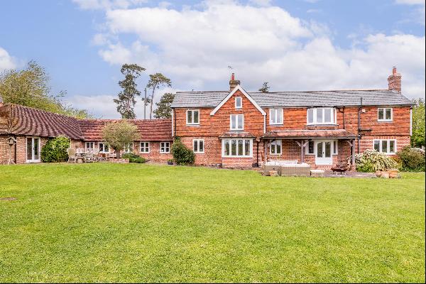 A charming Grade II listed well equipped farmhouse with stunning views over Bewl Water.