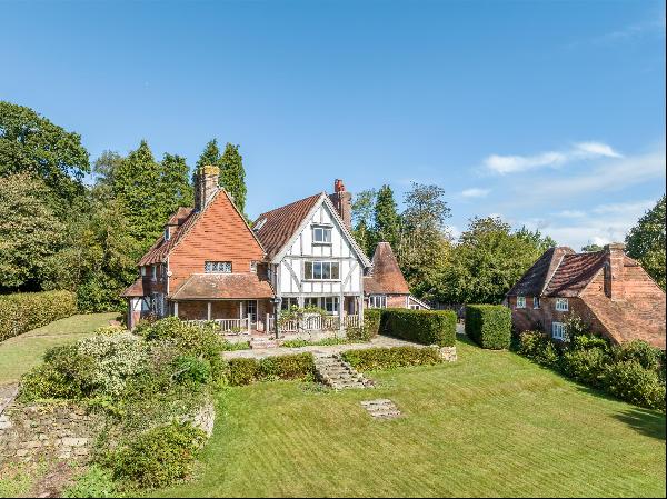 A wonderful opportunity to purchase a Grade II listed family home, with extensive outbuild