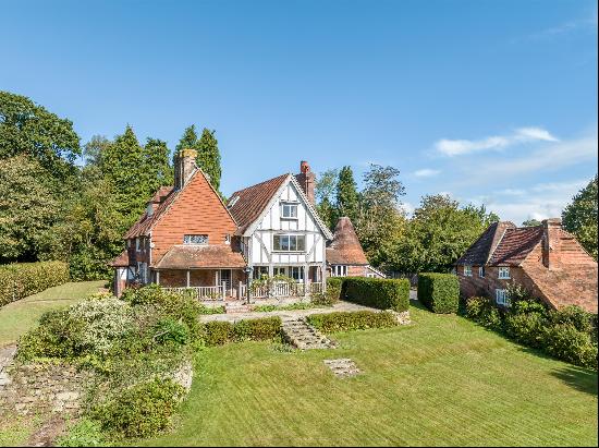 A wonderful opportunity to purchase a Grade II listed family home, with extensive outbuild