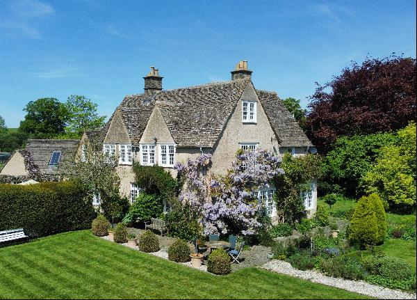 A wonderful edge of village period house set amongst delightful gardens near Oxford.