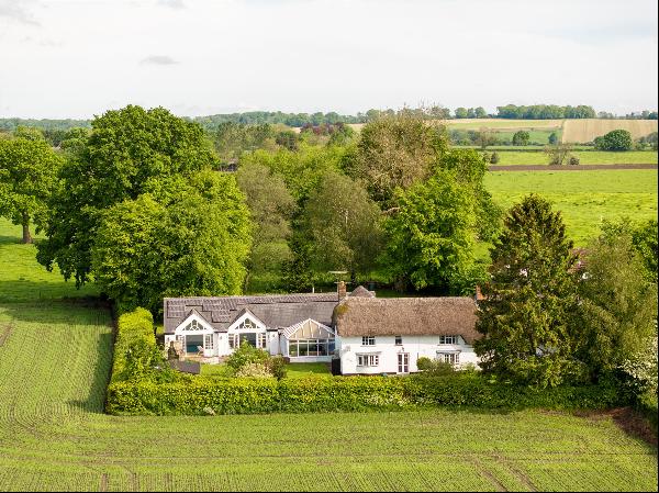 A period family house, with an indoor pool, situated in a peaceful, edge of village locati