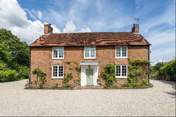 A substantial Grade II listed detached Georgian residence offering elegant and well-propor