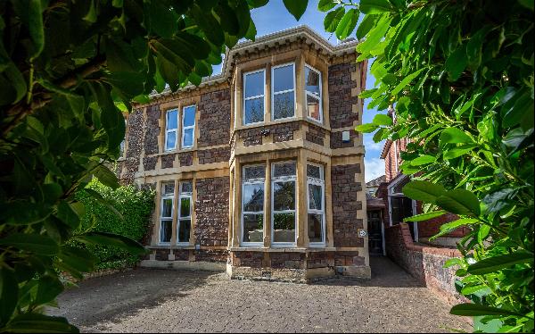 An impressive Victorian family home with south-west facing gardens and private parking, in