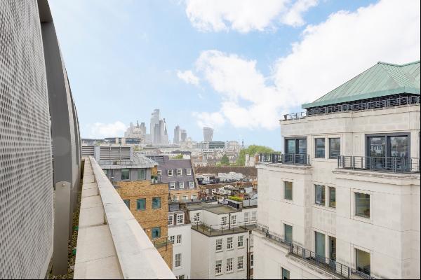 An immaculately finished three-bedroom apartment with far-reaching views