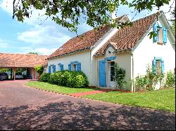 Maison nichee dans un havre de paix