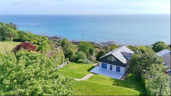 A Modern Four Bedroom Masterpiece Located In A Elevated Position On The East Coast