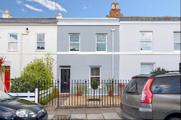 A superb renovated town house with detached office space.