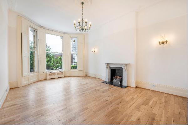 A 2 bedroom flat for sale on Fellows Road, NW3.
