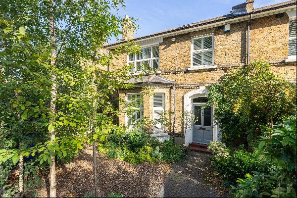 A beautiful four-bedroom family home located on a tree lined, residential road in the popu