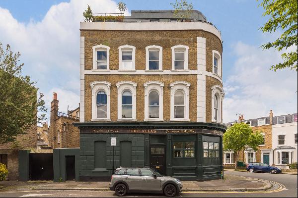 A striking duplex apartment on the second and third floors of a period building in a sough