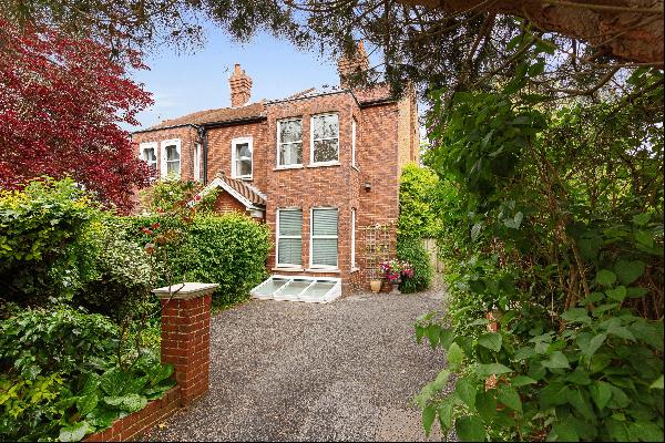 An attractive four bedroom semi-detached period property in The Drive, a prestigious centr