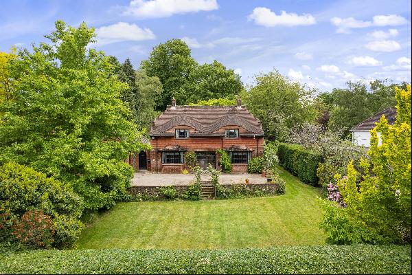 A rare opportunity to purchase a family home on a sought private road with park like garde