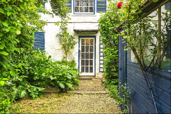 Charming period home in the heart of the village arranged over three floors with off stree