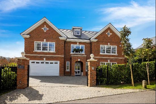 A detached five bedroom home for sale in Oxshott, KT22.