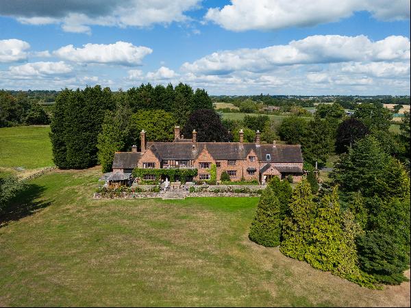 A handsome country house in a parkland setting with extensive south-facing views, apartmen