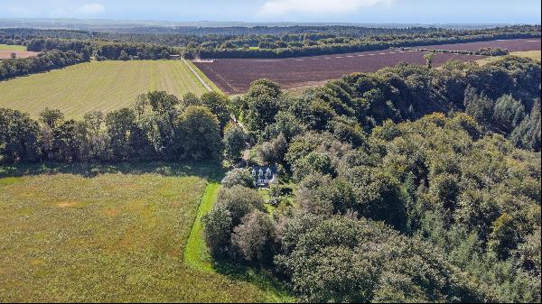 A pretty 3 bedroom detached former estate cottage, requiring renovation, in an incredibly 