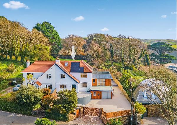 A newly renovated home, with fabulous terraces and gardens, a driveway providing parking f