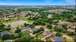 Nestled in cul-de-sac and steps away from pond