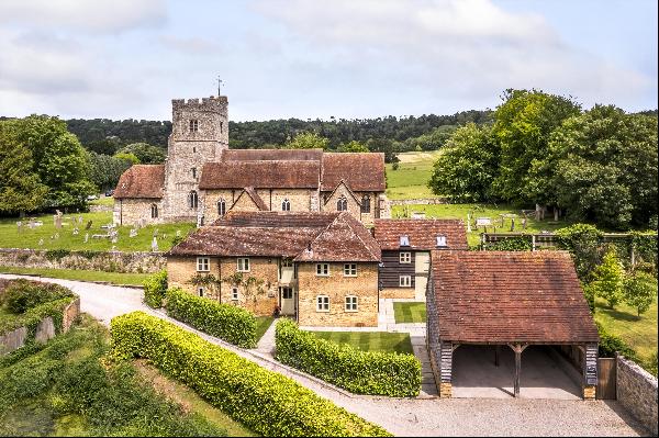 A beautifully updated Granary with adjoining cottage annex, set in the heart of a charming