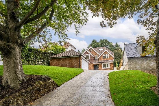 An exceptional new build family home located on this sought-after private road in central 