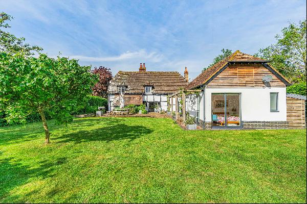 A wonderfully secluded Grade II listed house with large gardens in a small rural hamlet wi