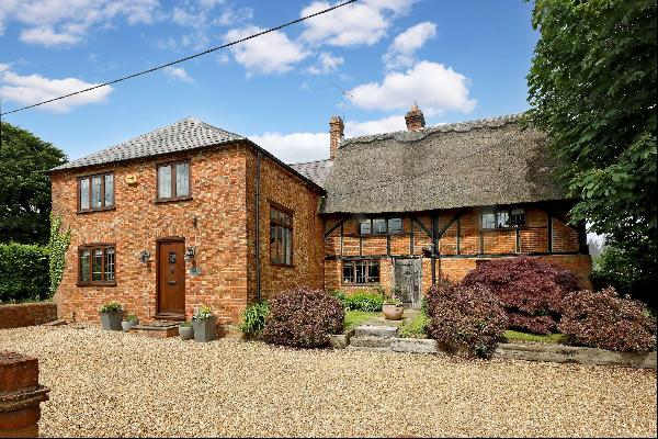 A Grade II Listed, village home with rural views and a separate two bedroom annexe.