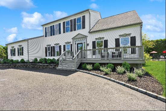 Down a private dead end street awaits your Hamptons Summer Retreat! With an expansive yard