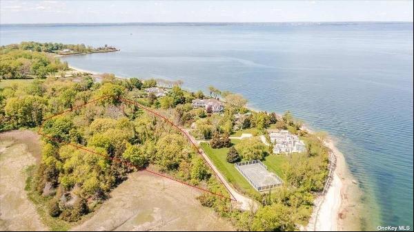 This property offers 5.22 acres  bordering a Private Beach with Views to Cove Neck  and 20