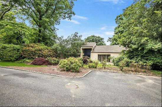 Welcome to this charming Old Westbury home, peacefully tucked away on a serene cul-de-sac 