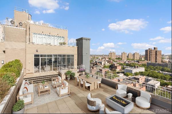 Welcome to a one-of-a-kind sunlit penthouse loft in one of Williamsburg's most iconic b