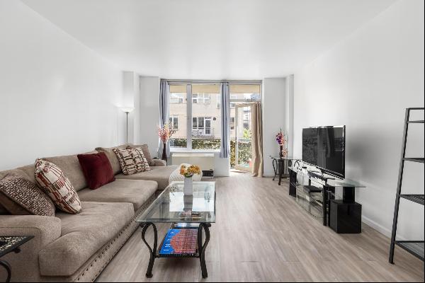 <p>Residence 402 is an expansive two-bedroom, two-bathroom apartment located in one of the