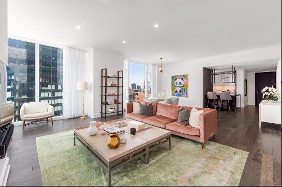 Perched high above the Flatiron District, with 10-foot ceilings and floor-to-ceiling