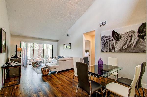 This bright single-story townhouse is available for lease. It boasts an open floorpan with