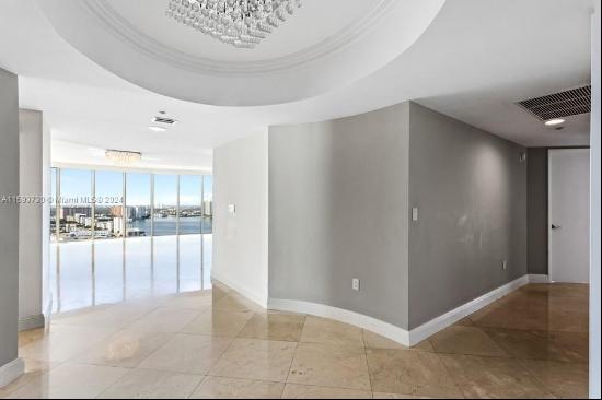 On the 28th floor of Ocean Three, this luxurious 2,864 sq. ft. residence offers three bedr