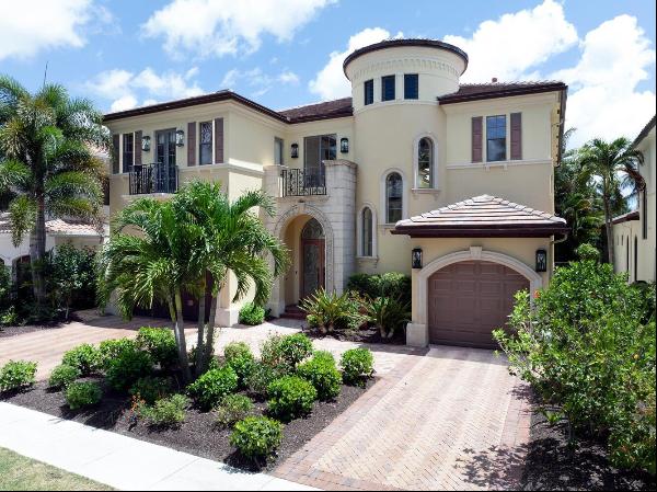 Welcome to luxury living at its finest in the prestigious community of The Oaks at Boca Ra