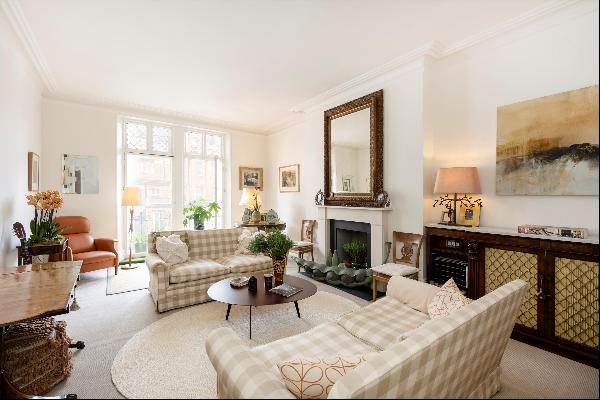 Four bedroom lateral flat for sale in Tite Street, SW3