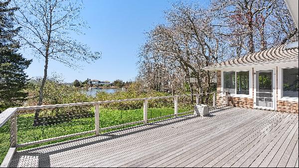 Welcome to 63 Lake Dr, Southampton, NY 11968, a stunning waterfront home nestled in the se