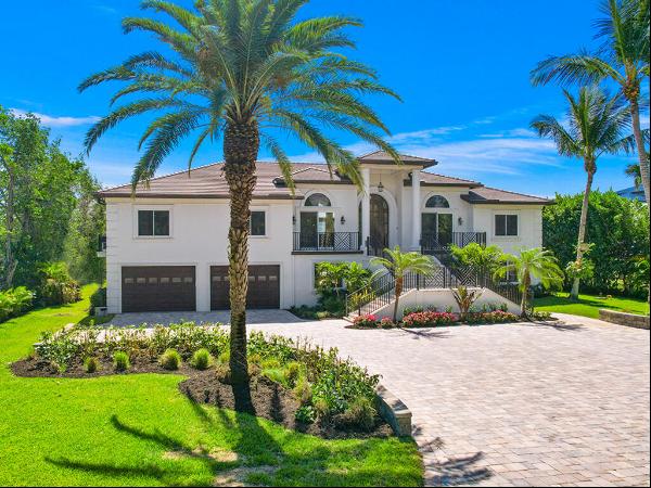 This private, gated ''Legacy Estate'' is located on an expansive 1.25 acres with over 162'