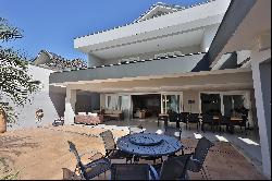 Luxurious contemporary mansion with landscaping and full amenities