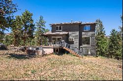 Captivating log home is nestled in the picturesque mountains of Pine, Co.