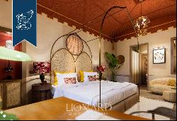 Wonderful luxury hotel with a private courtyard and a panoramic terrace for sale in the he