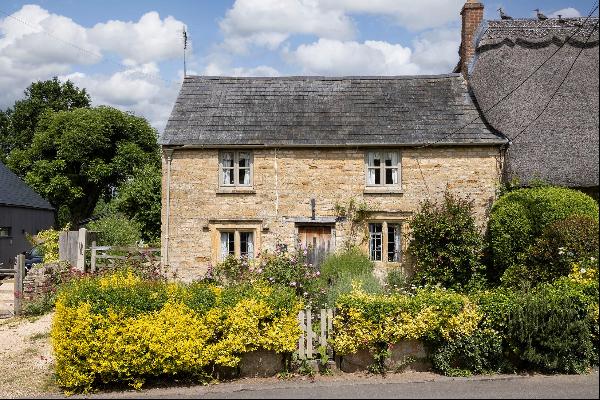 Quintessential Grade II listed Cotswold stone cottage in sought-after village