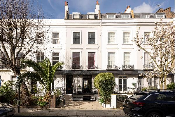 A superb four bedroom terraced house in Notting Hill, W2.