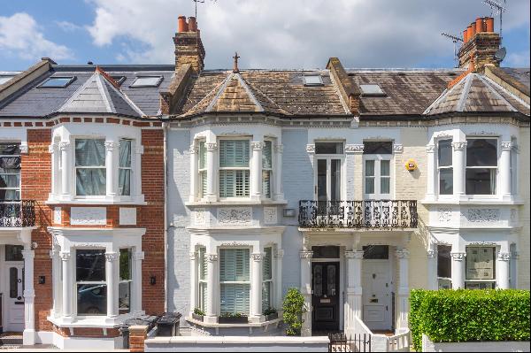 A charming four-bedroom family home with a southwest-facing garden.