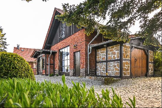 Modern half-timbered house with spacious parkland on the Wiehengebirge