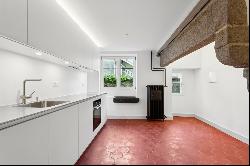 Beautifully renovated town house with commercial premises