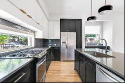 Modern single family with large kitchen with an island-style countertop