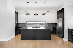 Modern single family with large kitchen with an island-style countertop