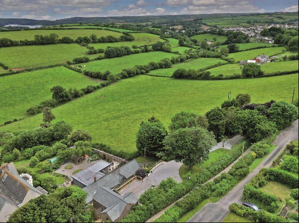 A beautiful contemporary home with far-reaching rural views in a quiet setting on the edge